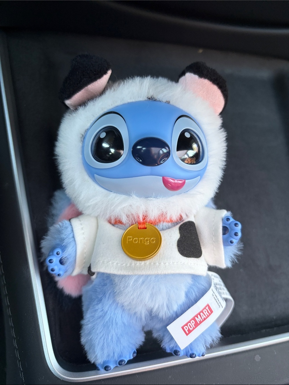 Blue Plush Character Doll with White Hoodie and Gold Tag